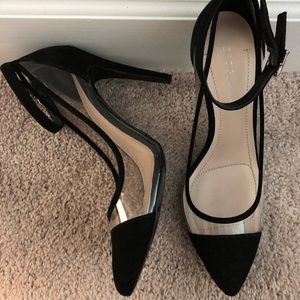 Black and clear pumps